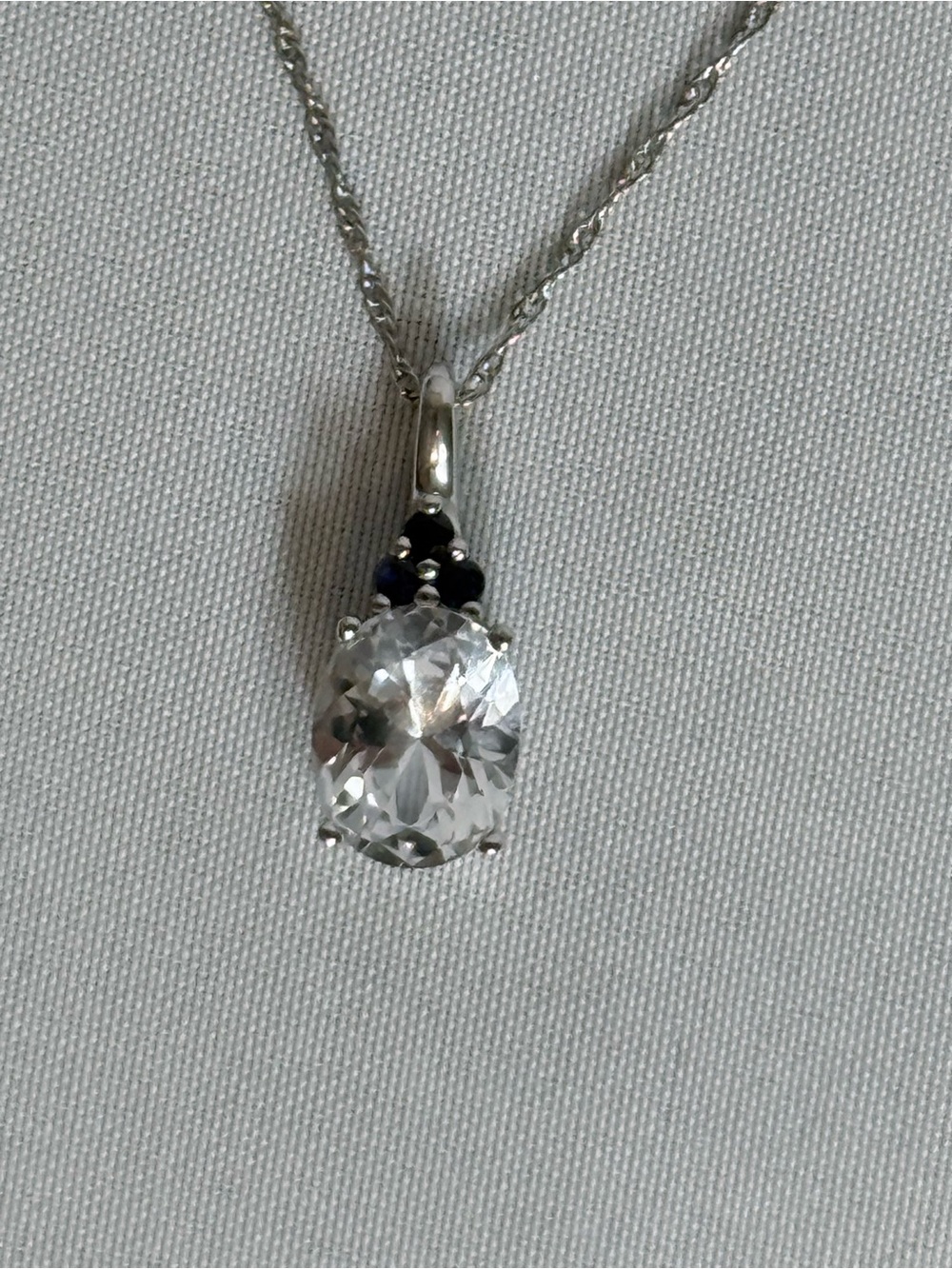 Helzberg Diamonds white sapphire pendant with blue accent stones